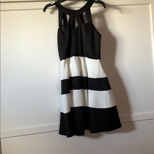 A black and white striped fancy dress